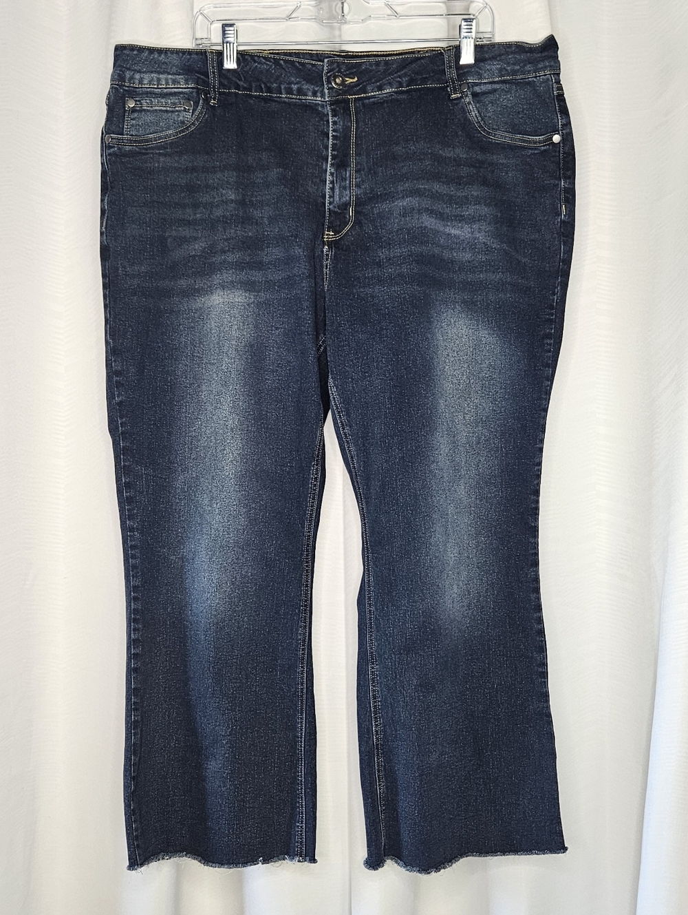 Bloomchic medium wash wide flare leg cropped jeans with raw hem